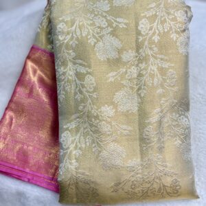 Pastel colour brocade saree with blush pink and zari filled border