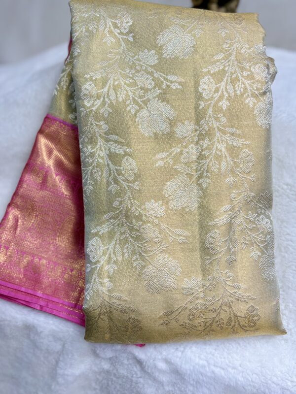 Pastel colour brocade saree with blush pink and zari filled border