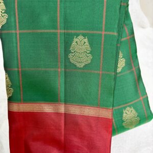 Bottle green checked with oil red border with rich pallu